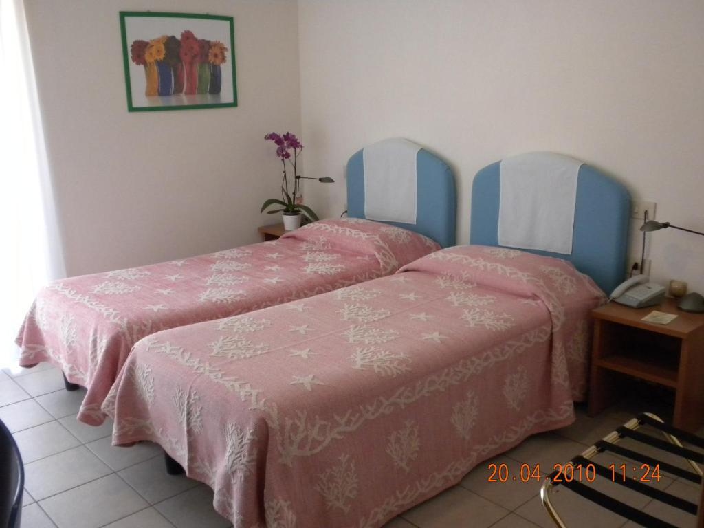 Hotel La Roccia Palau Cameră foto